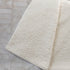 50" X 70" Ivory And Beige Geometric Microfiber Plush Throw Blanket