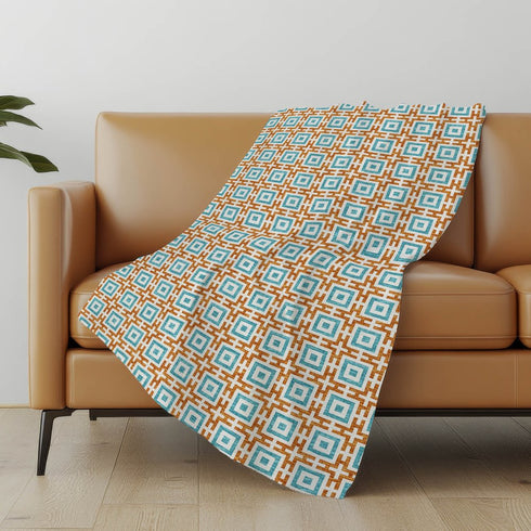 50" X 70" Orange Ivory And Teal Geometric Microfiber Plush Throw Blanket