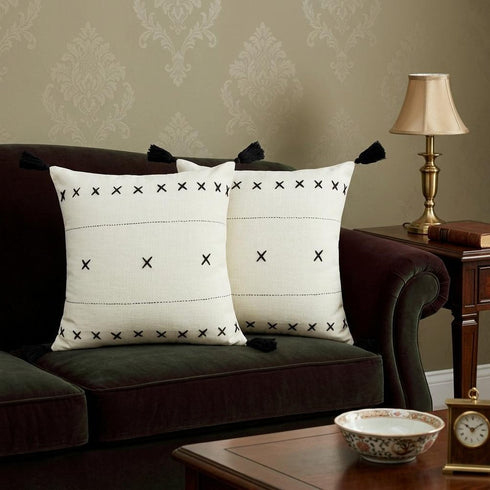 Set of Two 20" Off White And Black Geometric Cotton Throw Pillows with Tassels