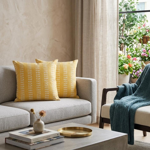 Set of Two 20" Yellow And White Polka Dot Cotton Throw Pillows