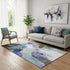 5' X 8' Brown And Teal Abstract Washable Area Rug With UV Protection