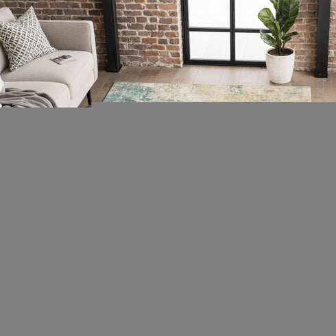 8' X 10' Ivory And Teal Abstract Washable Area Rug With UV Protection