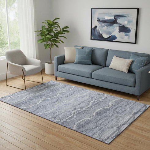 5' X 8' Blue And Ivory Abstract Geometric Washable Area Rug With UV Protection