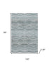 8' X 10' Teal And Ivory Abstract Geometric Washable Area Rug With UV Protection