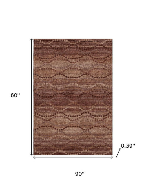 5' X 8' Rust And Copper Abstract Geometric Washable Area Rug With UV Protection