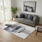 5' X 8' Brown And Ivory Abstract Washable Area Rug With UV Protection