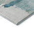 5' X 8' Teal And Ivory Abstract Washable Area Rug With UV Protection