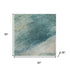 5' X 8' Teal And Ivory Abstract Washable Area Rug With UV Protection