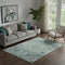 5' X 8' Teal And Ivory Abstract Washable Area Rug With UV Protection