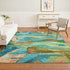 8' X 10' Teal And Blush Abstract Washable Area Rug With UV Protection
