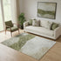 5' X 8' Green And Ivory Abstract Washable Area Rug With UV Protection