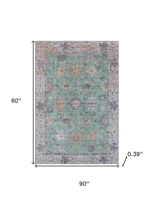 5' X 8' Mint Green And Peach Oriental Washable Area Rug With UV Protection