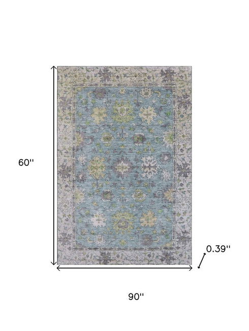 5' X 8' Pale Aqua And Teal Oriental Washable Area Rug With UV Protection