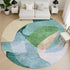 8' Green And Teal Abstract Washable Round Rug With UV Protection