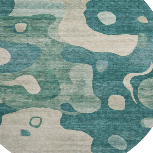 8' Teal And Ivory Abstract Washable Round Rug With UV Protection