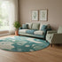 8' Teal And Ivory Abstract Washable Round Rug With UV Protection