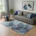 5' X 8' Blue And Ivory Abstract Washable Area Rug With UV Protection