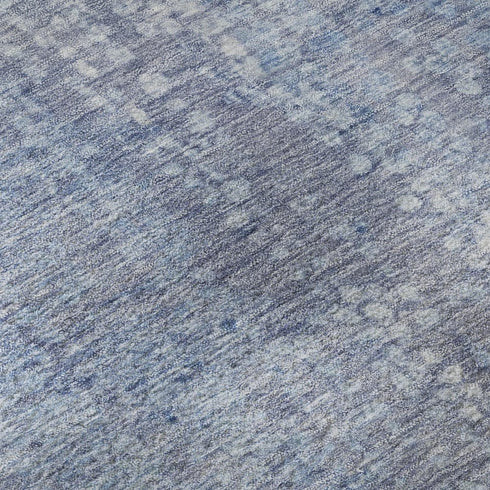 5' X 8' Blue And Ivory Abstract Washable Area Rug With UV Protection