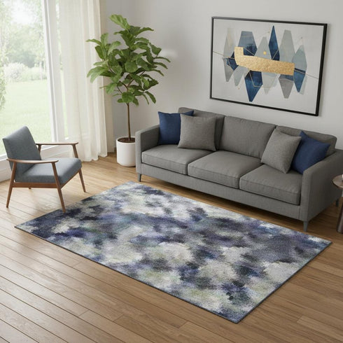 5' X 8' Blue And Ivory Abstract Washable Area Rug With UV Protection