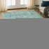 8' X 10' Teal And Ivory Abstract Washable Area Rug With UV Protection