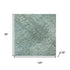 8' X 10' Teal And Ivory Abstract Washable Area Rug With UV Protection