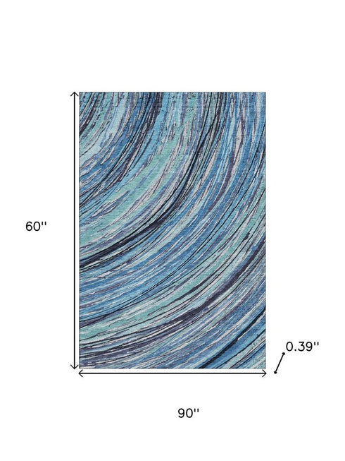 5' X 8' Blue And Ivory Abstract Washable Area Rug With UV Protection