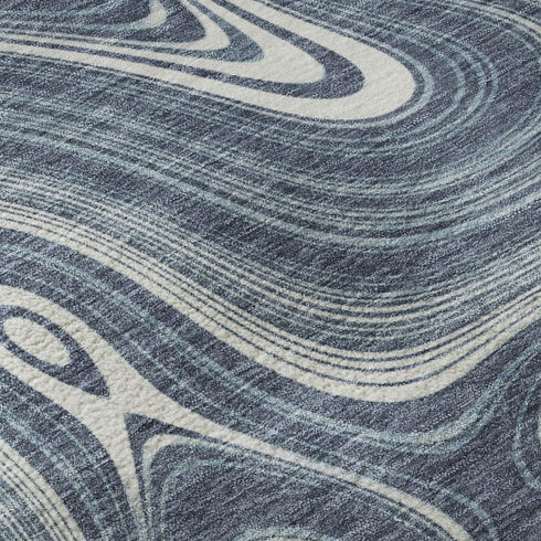 5' X 8' Blue And Ivory Geometric Washable Area Rug With UV Protection
