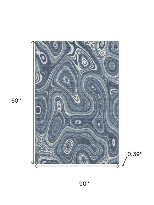 5' X 8' Blue And Ivory Geometric Washable Area Rug With UV Protection