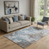 5' X 8' Brown And Blue Abstract Washable Area Rug With UV Protection