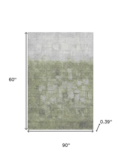 5' X 8' Fern Green And Silver Abstract Washable Area Rug With UV Protection