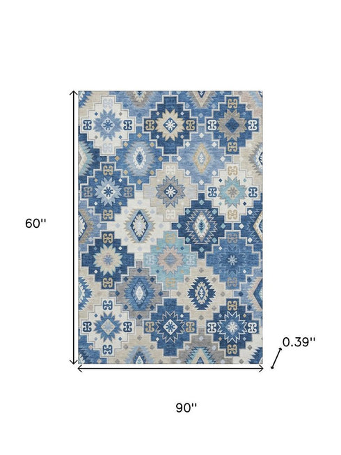 5' X 8' Blue And Beige Geometric Washable Area Rug With UV Protection