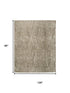 8' X 10' Green And Tan Abstract Area Rug