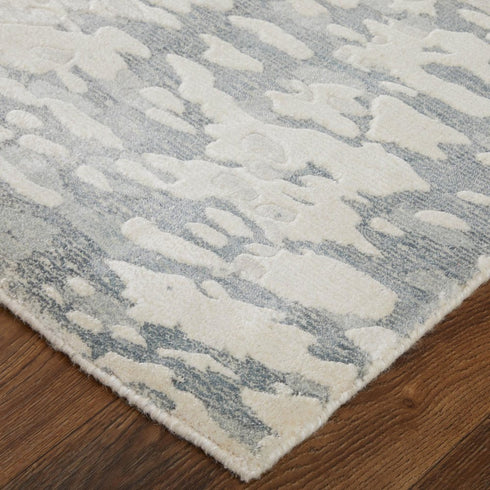 5' X 8' Blue And Ivory Abstract Hand Woven Area Rug