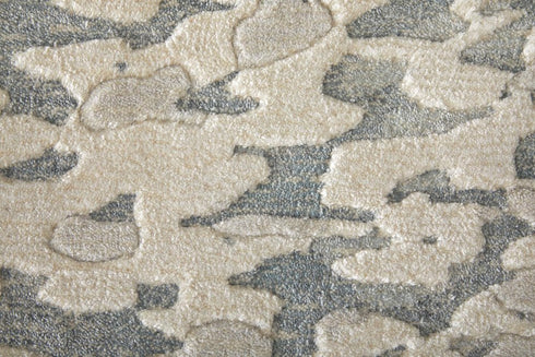 5' X 8' Blue And Ivory Abstract Hand Woven Area Rug