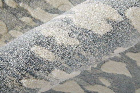 8' X 10' Blue And Ivory Abstract Hand Woven Area Rug