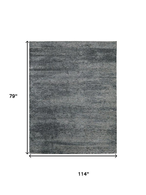 6' X 9' Blue And Ivory Abstract Area Rug
