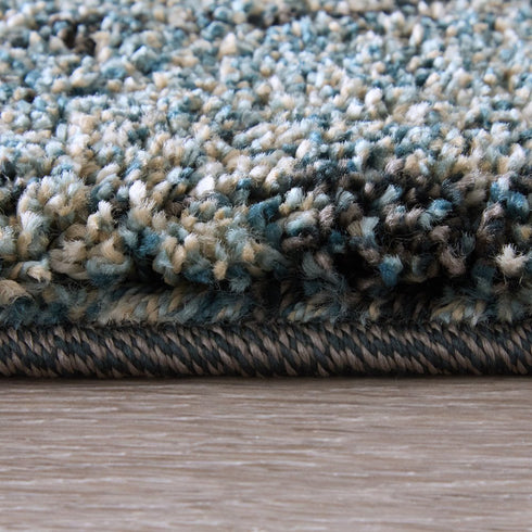 6' X 9' Blue And Ivory Abstract Area Rug