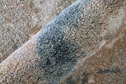 9' X 12' Blue And Ivory Abstract Area Rug