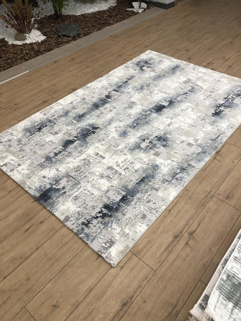 5' X 8' Blue And White Abstract Distressed Area Rug