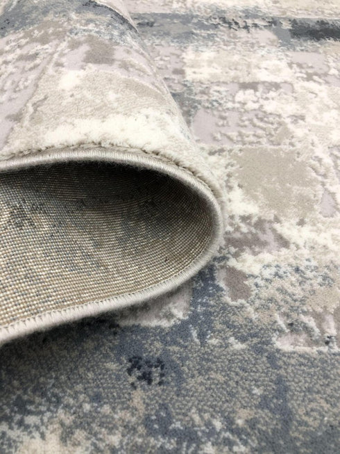 5' X 8' Blue And White Abstract Distressed Area Rug