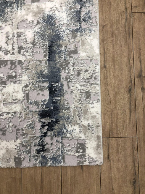 5' X 8' Blue And White Abstract Distressed Area Rug