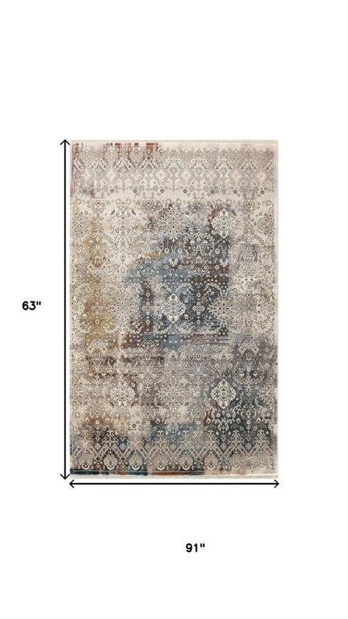 5' X 8' Blue And Orange Medallion Distressed Area Rug With Fringe