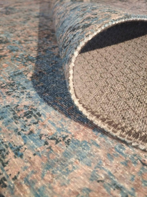 5' X 8' Blue And Orange Abstract Distressed Area Rug