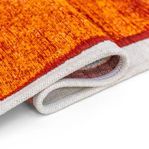 6' X 8' Orange And White Abstract Washable Area Rug With UV Protection