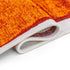 7' X 9' Orange And White Abstract Washable Area Rug With UV Protection