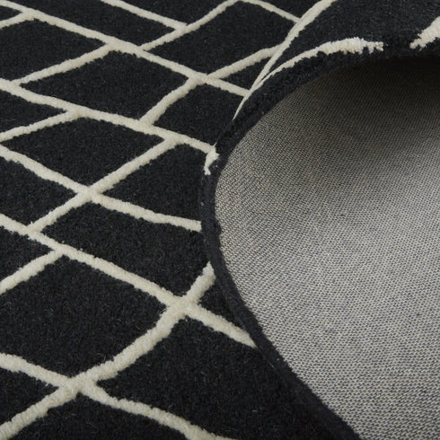 5' X 8' Black And Ivory Wool Geometric Hand Tufted Area Rug