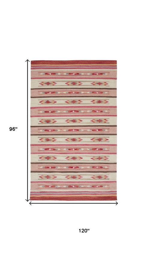 8' X 10' Tan Black And Orange Southwestern Hand Woven Area Rug