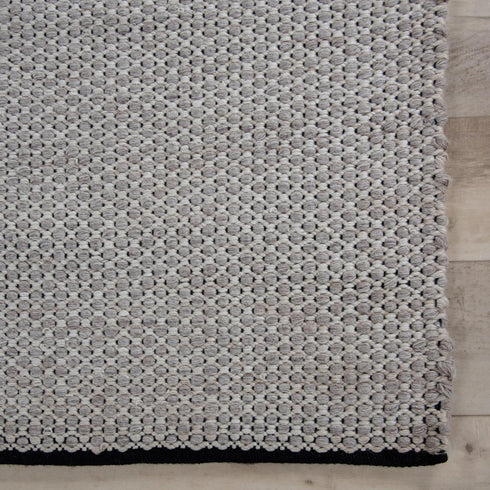 8' X 10' Beige Ivory And Black Geometric Hand Woven Area Rug With UV Protection