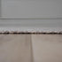 8' X 10' Beige Ivory And Black Geometric Hand Woven Area Rug With UV Protection