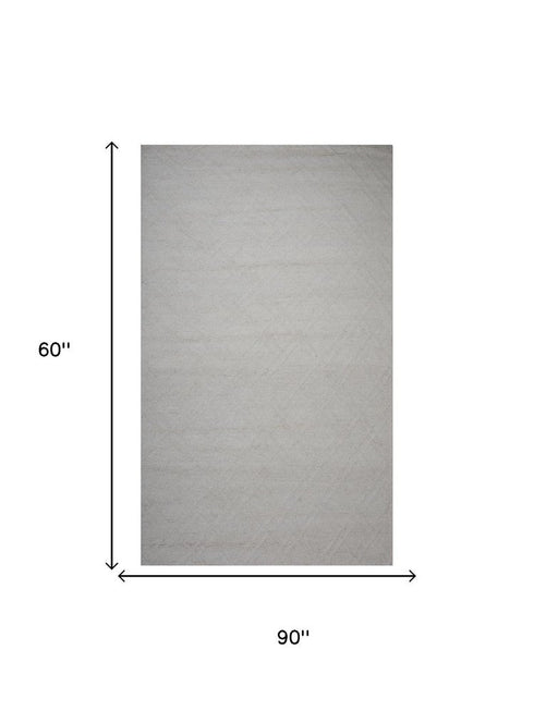 5' X 8' Ivory And Natural Wool Geometric Hand Tufted Area Rug